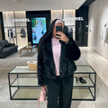 Fourrure avec capuche Noir